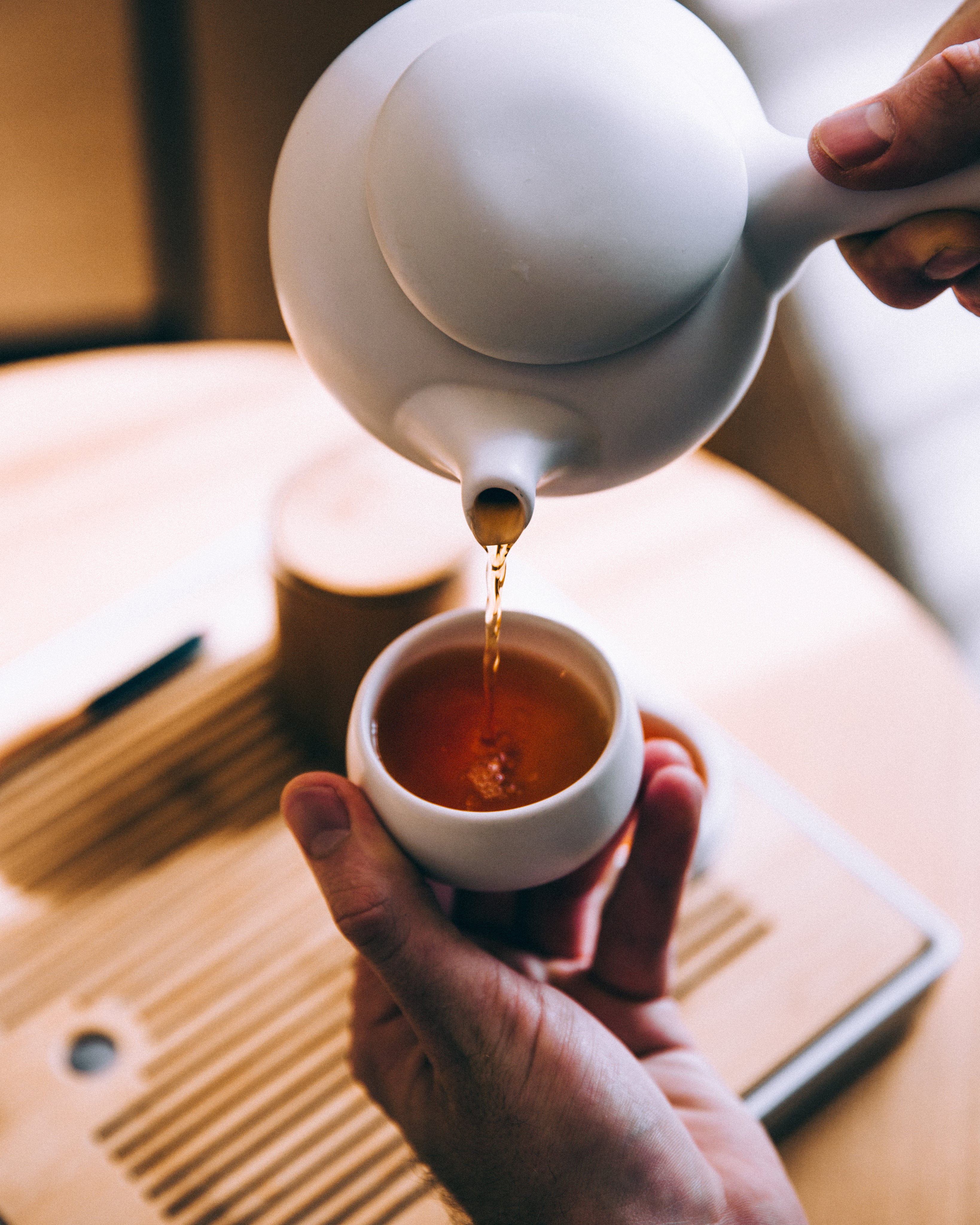 pouring saffron tea